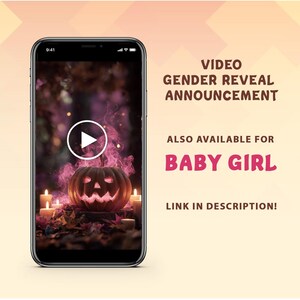 May include: A smartphone displays a video gender reveal announcement. The video features a carved pumpkin with pink smoke, candles, and the text "VIDEO GENDER REVEAL ANNOUNCEMENT." The text "ALSO AVAILABLE FOR BABY GIRL" is also visible.