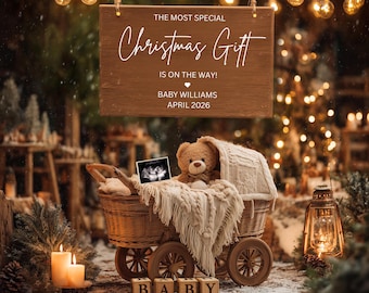 May include: A wooden sign with the text "THE MOST SPECIAL Christmas Gift IS ON THE WAY! BABY WILLIAMS APRIL 2026" hangs above a wicker baby carriage. Inside the carriage is a teddy bear, blanket, and sonogram. Wooden blocks spell "BABY".