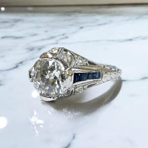 Antique Art Deco 1.25 Carat Diamond and Sapphire Platinum Engagement Ring