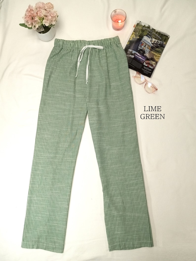 May include: Lime green striped pants with a drawstring waist.