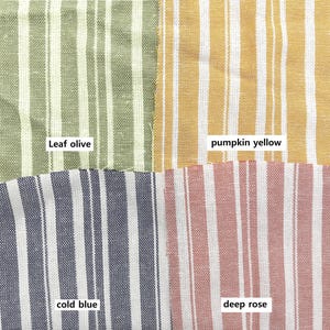 May include: Four fabric swatches with white stripes and different colored stripes. The swatches are labeled "leaf olive", "pumpkin yellow", "cold blue", and "deep rose".