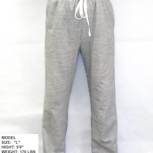 May include: A pair of gray and white striped pants with a drawstring waist. The pants are made of a lightweight fabric and have a relaxed fit.
