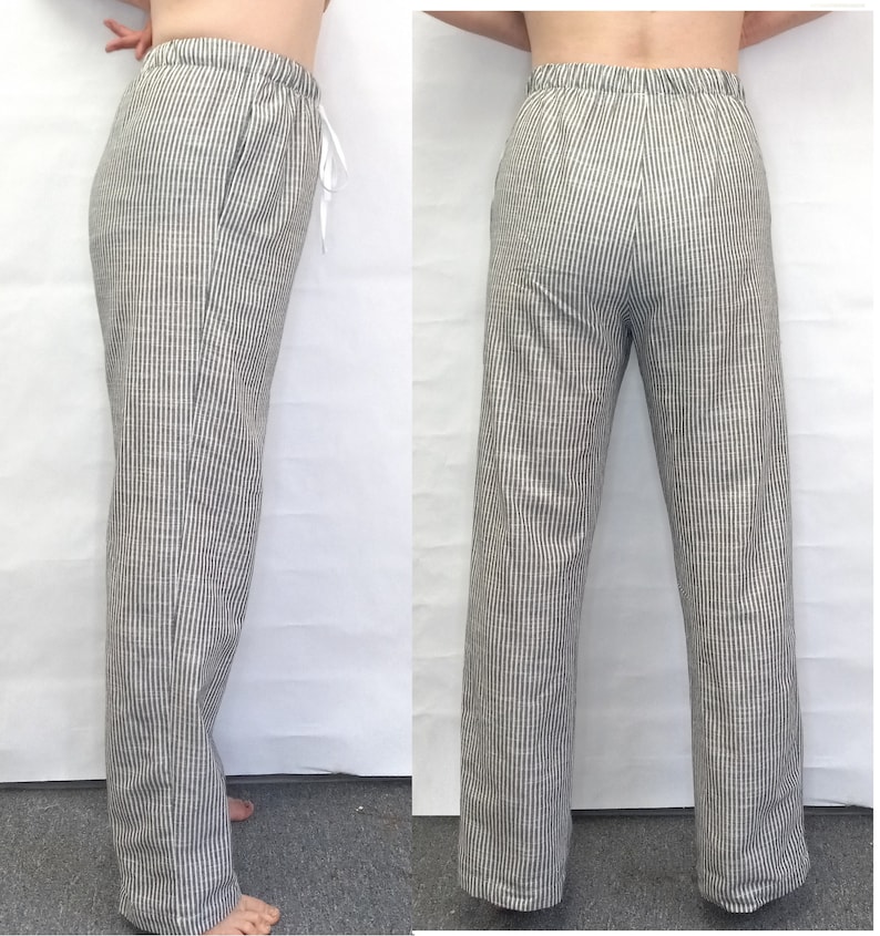 May include: A pair of black and white striped pants with a drawstring waist.