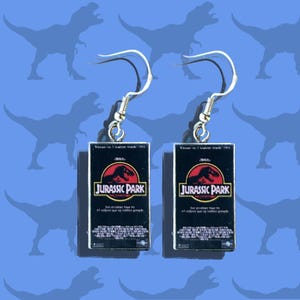 Nostalgic Jurassic Park VHS earrings.