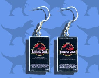 Nostalgic Jurassic Park VHS earrings.