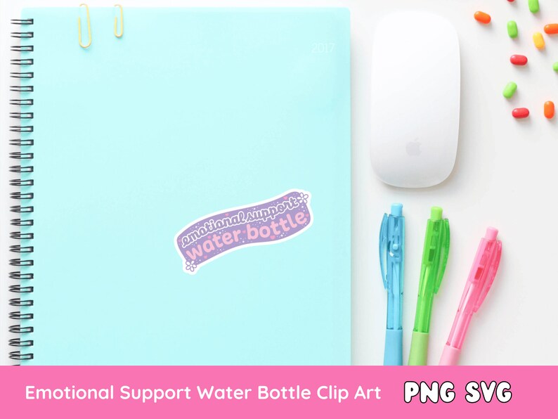 May include: A light blue notebook with a spiral binding and a sticker that says "emotional support water bottle". The sticker is purple with pink lettering and a white flower.