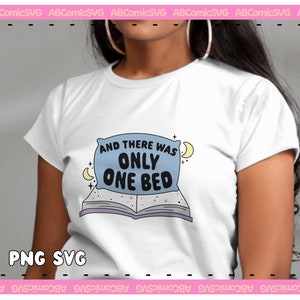 May include: A white t-shirt with a blue pillow and a book with stars on it. The pillow has the text "And there was only one bed" on it.