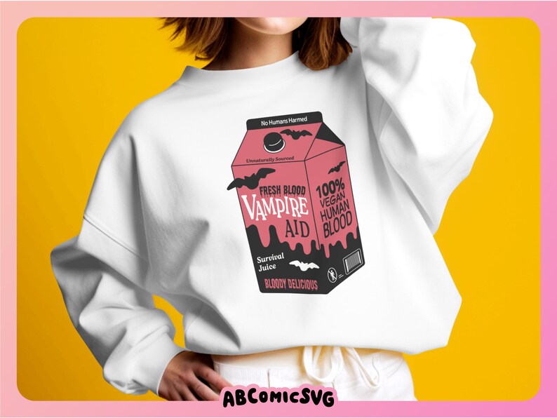May include: A white sweatshirt with a graphic of a pink and black carton of "Fresh Blood Vampire Aid" with the text "100% Vegan Human Blood" and "Bloody Delicious".
