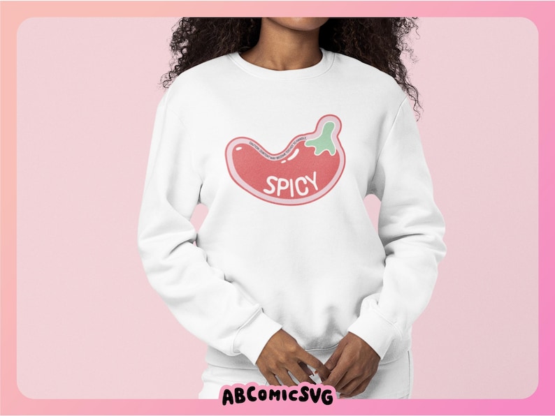 May include: White sweatshirt with a red and green chili pepper graphic and the word "SPICY" in pink lettering.