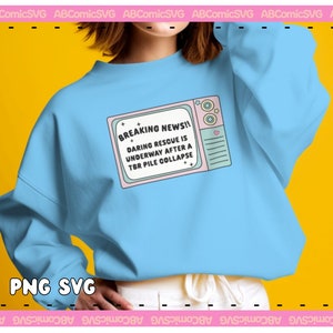May include: A light blue sweatshirt with a graphic of a retro television screen that says "BREAKING NEWS!! DARING RESCUE IS UNDERWAY AFTER A TBR PILE COLLAPSE".