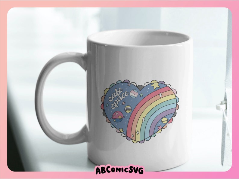 May include: White ceramic mug with a rainbow heart design. The heart has a blue background with stars, planets, and the text "cute spice" inside.