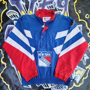 May include: A set of three ceramic mugs with a speckled, matte finish. The mugs are in shades of cream, light gray, and dark gray. Each mug has a simple, minimalist design, perfect for coffee or tea.