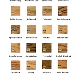May include: A grid of twenty-four wood stain color samples, each featuring a small paint can icon and a text label. The colors range from light grays and tans to deep browns, mahoganies, and black, displaying various wood grain textures.