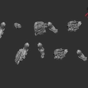 May include: A collection of gray, miniature mechanical components, including arms, heads, and weapon attachments, are scattered against a dark background. The pieces appear to be from a model kit or a miniature figure, possibly for tabletop gaming or hobby projects.