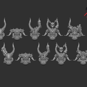 Op de afbeelding: Een verzameling van tien grijze miniatuurbeeldjes met gehoornde, schedelachtige gezichten. De ontwerpen variëren, sommige met kettingen, spikes en sierlijke details. De beeldjes zijn gerangschikt op een donkergrijze achtergrond.