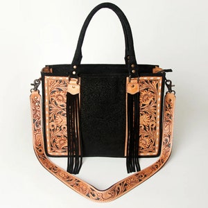 Handcrafted Western Purse Premium Leather Construction Hand Tooled Floral Pattern Traditional Cowgirl Design Concealed Carry Feature Removable Shoulder Strap Fringe Detail Accent American Cowhide Material Practical Storage Options Country