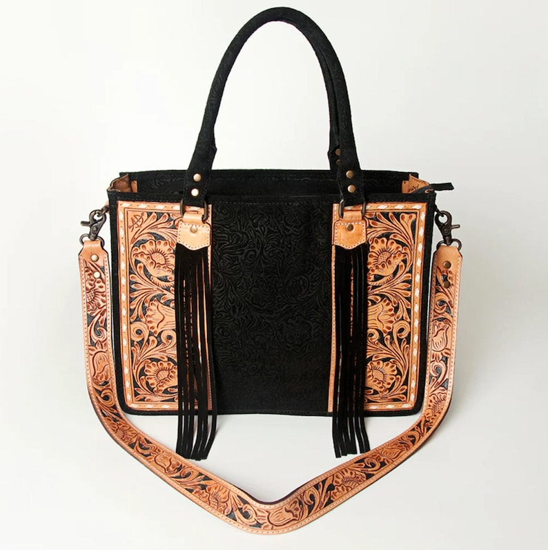 Handcrafted Western Purse Premium Leather Construction Hand Tooled Floral Pattern Traditional Cowgirl Design Concealed Carry Feature Removable Shoulder Strap Fringe Detail Accent American Cowhide Material Practical Storage Options Country
