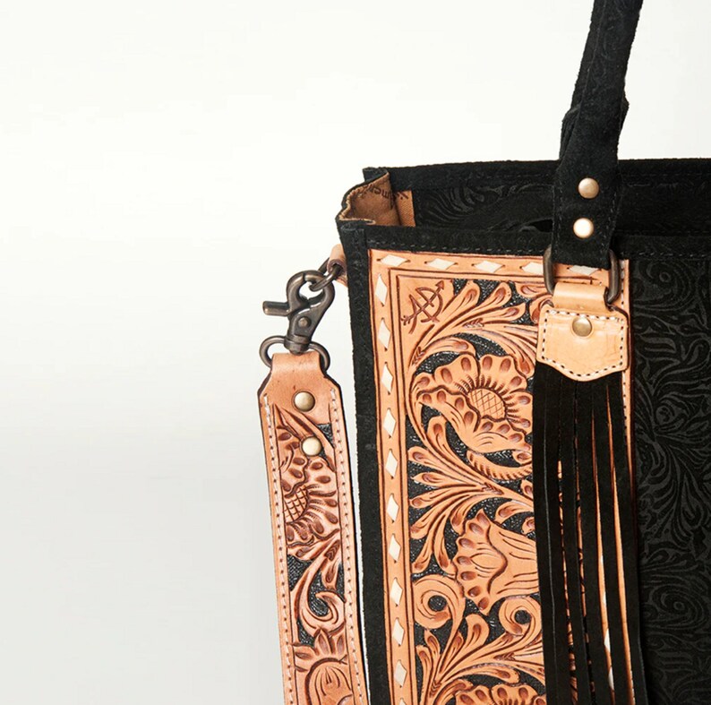 Hand Tooled Leather Handbag Western Style Design Premium Cowhide Construction Floral Pattern Detail Fringe Accent Feature Concealed Carry Compartment Removable Shoulder Strap Country Fashion Statement Practical Storage Solution Rodeo Ready