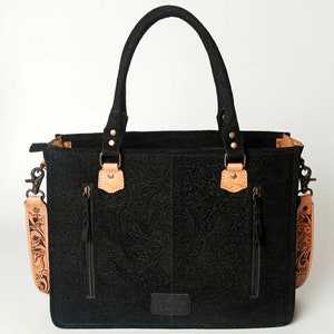 Premium Leather Handbag Western Style Design Hand Tooled Pattern American Cowhide Material Black Tan Color Scheme Fringe Detail Enhancement Concealed Carry Feature Removable Shoulder Strap Practical Storage Compartment Country Fashion
