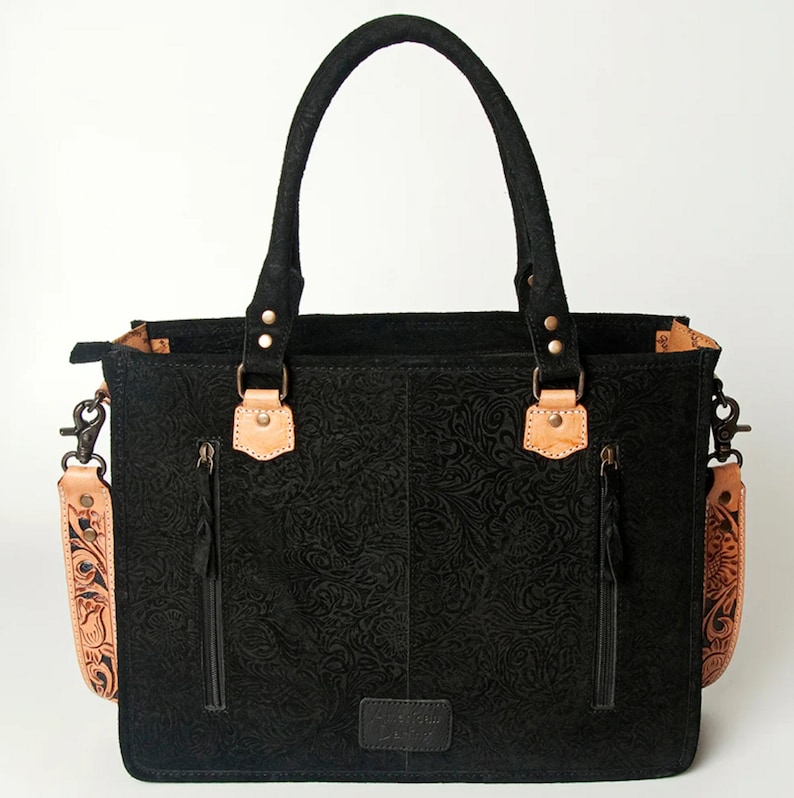 Premium Leather Handbag Western Style Design Hand Tooled Pattern American Cowhide Material Black Tan Color Scheme Fringe Detail Enhancement Concealed Carry Feature Removable Shoulder Strap Practical Storage Compartment Country Fashion
