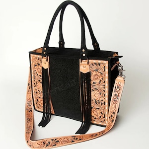 Western Leather Handbag Hand Tooled Floral Design American Cowhide Construction Premium Quality Craftsmanship Black Tan Color Combination Fringe Detail Accent Concealed Carry Compartment Removable Shoulder Strap Country Style Fashion
