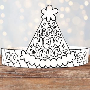 以下が含まれることがあります： 「Happy New Year」の文字と「2026」の年号が入った、白黒の新年パーティーハット。帽子は円錐形で、装飾的なトップと頭にフィットするバンドが付いています。