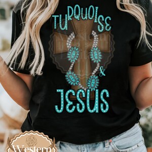 May include: Black t-shirt with the text "Turquoise & Jesus" in turquoise blue lettering. A turquoise cross with a turquoise and pearl necklace is behind the text.