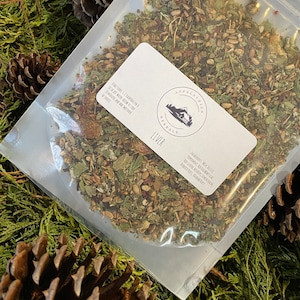 May include: A clear plastic bag filled with a blend of dried herbs labelled "Liver" by Appalachian Herbals. The label includes directions for use: "Directions: 1-2 tablespoons per 1 cup of hot water. Allow to steep for 10 minutes. Add honey or other sweetener as desired."