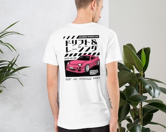 May include: White t-shirt featuring a pink sports car graphic with Japanese text and the words "Japanese Sports Car" and "Drift & Racing". The design includes the text "Race No. 09" and "Japanese Domestic Market".