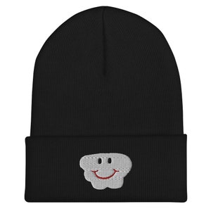 May include: Black beanie with a gray smiley face cloud embroidered on the front.