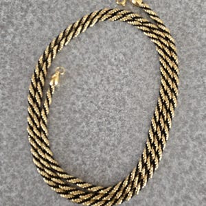 Goldtone and black twisted rope chain necklace 36&quot;