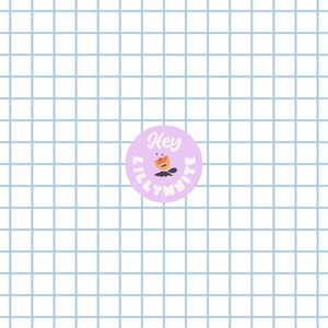 May include: A round, light purple sticker with the text "Hey" and "Lillywhite" in a circular arrangement. The sticker features a cartoon illustration of a smiling pumpkin and a bat. The background is a grid of light blue lines.