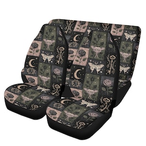 May include: A set of car seat covers featuring a repeating patchwork pattern of moths, roses, crescent moons, and ornate keys in shades of dark green, black, and muted pink. The design is printed across two front seat covers and one rear bench cover.