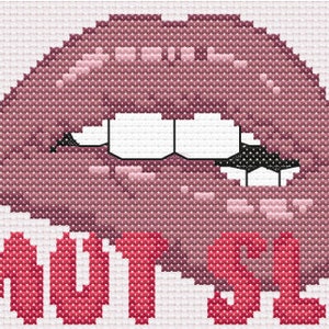 May include: Cross-stitch embroidery design featuring a pair of red lips with white teeth and the text "SMUT SLUT" in red.