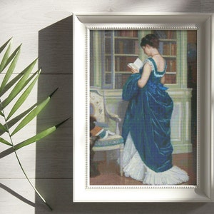 May include: A framed painting of a woman in a blue dress reading a book in a library setting.