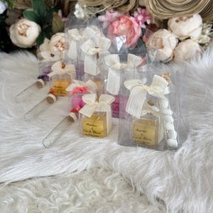Sac cadeau avec bougie et fiole de dragées