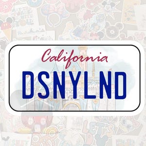 May include: A white license plate-shaped sticker with the word "California" in red script above the blue text "DSNYLND". A castle illustration is in the background. The sticker is surrounded by various Disney-themed stickers.