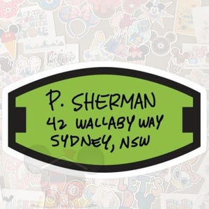 May include: A sticker with a green background and black border, featuring the text "P. SHERMAN 42 WALLABY WAY SYDNEY, NSW" in black. The sticker is surrounded by various Disney-themed stickers.