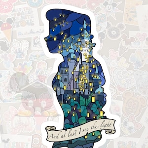 May include: A sticker featuring a silhouette of a person filled with a castle scene and floating lanterns. The sticker is blue, teal, and yellow with the text "And at last I see the light" on a banner.