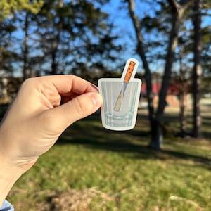 May include: A clear glass with a straw and the text "I think I will cause problems today".