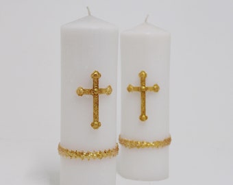 Vela cristiana artesanal con cruz dorada, ideal como regalo de bautizo o boda.