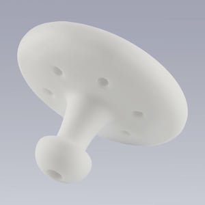 May include: A white, mushroom-shaped object with a flat, perforated top and a rounded stem. The object is made of a smooth, matte material and is set against a light gray background. The design is simple and modern.