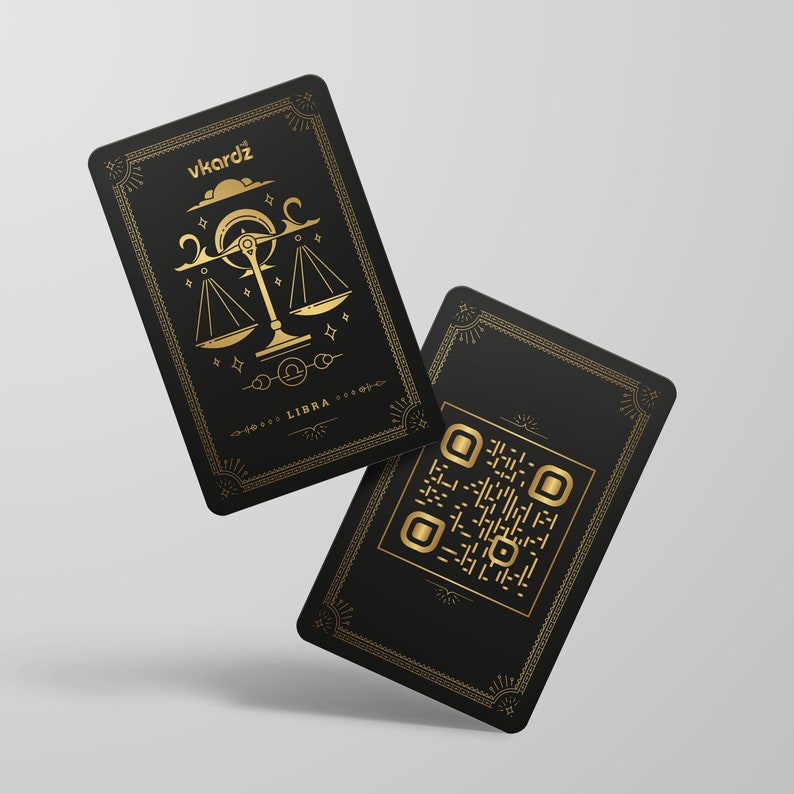 K&ouml;nnte beinhalten: Zwei schwarze Karten mit goldenen Akzenten. Die obere Karte zeigt eine goldene Illustration eines Libra-Sternzeichen-Symbols mit dem Text "vkaradz" und "LIBRA". Die untere Karte zeigt einen goldenen QR-Code.