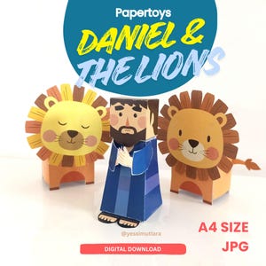 May include: Papercraft set featuring Daniel and two lions. The Daniel figure is in a blue robe, and the lions have yellow and brown manes. The text "DANIEL & THE LIONS" is in a blue circle. The image also includes the text "A4 SIZE JPG".