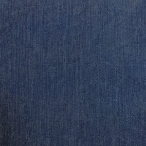 May include: A close-up of a dark blue denim fabric with a woven texture.