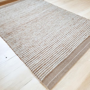 Handgeweven wollen jute vloerkleed: dikke kiezelstructuur, natuurlijke vezels