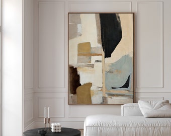 May include: Abstract art painting with brown, beige, and blue colors on a white canvas. The painting is hanging on a white wall above a white couch and a black coffee table.