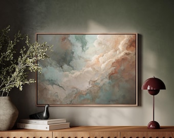 Ingelijst abstract canvas kunstwerk in zachtroze en turquoise tinten, print van een zonsondergang met een gedempte, moderne en neutrale wanddecoratie. Warme, dromerige wolkenwanddecoratie voor de woonkamer.