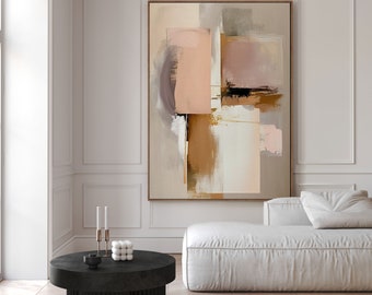 May include: A white sofa with a black coffee table in front of it. The wall behind the sofa has a large abstract painting with brown, pink, and white colors.