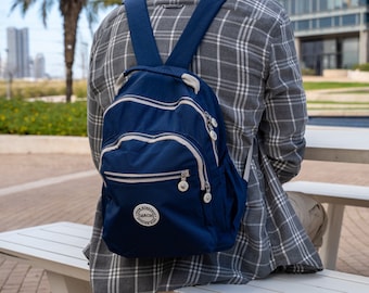 Unisex Reiserucksack, wasserfester blauer Rucksack, minimalistischer Reiserucksack mit Reißverschluss, mittelgroße Geldbörse, Schulanfang, Umhängetasche